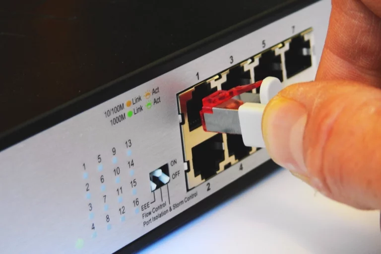 A network switch with patch cables connected to its ports